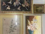 many framed pictures on the wall of this room