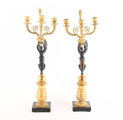 pair of antique brass candelabs on marble bases