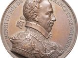une image représentant une médaille d'argent sur laquelle figure le portrait d'un homme
