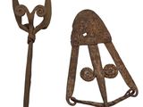 pair of old rusty garden tools on a white background