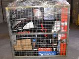 a cart with a bunch of items in it in a warehouse