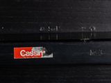 a close up of a suitcase with a sticker on it