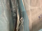 a toothbrush in a plastic bag on a table