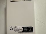 a white box with a black and white logo on it