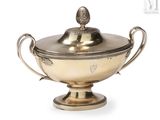 an antique silver plated bowl with a lid on a pedestal