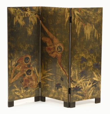 an oriental screen with birds and flowers painted on it