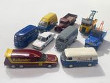 a lot of toy cars that are sitting on a table