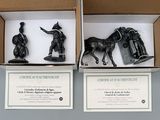 two figurines of a man and a horse in a box
