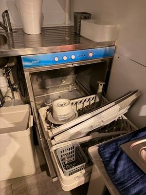 an image of a kitchen with a dishwasher and a sink