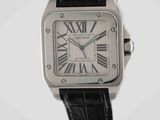 an image of a wrist watch with roman numerals on a black strap