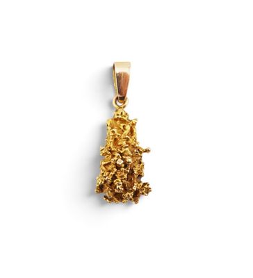 a gold pendant with a small piece of gold on it