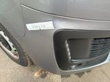 a close up of a car ' s bumper with a sticker on it