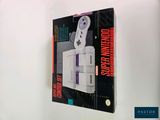 a box with a game controller on it on the wall