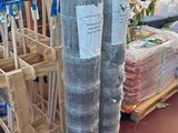 a large pile of plastic wrap on a pallet in a store