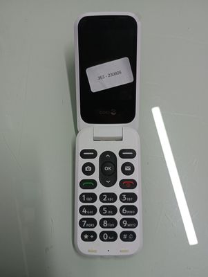 a cell phone that has a sticker on the back of it