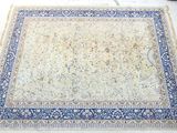 a rug on the floor in the middle of the room
