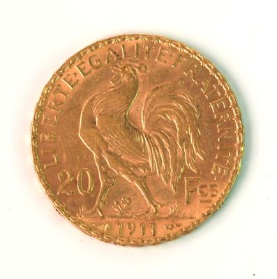 an image of a gold coin with a rooster on it