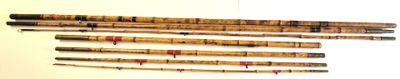 five different types of bamboo sticks on a white surface
