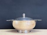 an image of a bowl with a lid sitting on a table