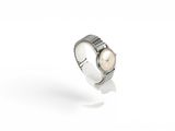 a close up of a watch on a white surface with a white background