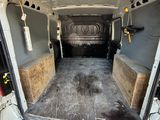 a white van that is parked in a lot