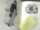 un livre ouvert sur lequel figure le dessin d'un homme coiffé d'un haut-de-forme
