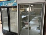 two refrigerated refrigerators in a store