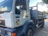 a truck that is parked on the side of the road