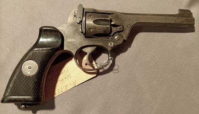 a gun that is sitting on a table