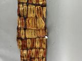 une image représentant un morceau de tissu sur lequel figurent des mots