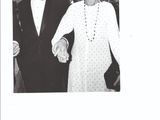 black and white photograph of a man and a woman holding hands