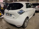 a white car that is parked in a garage