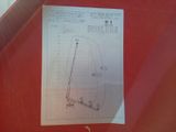 a sheet of paper with a drawing of a sailboat on it