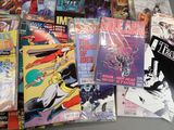 a lot of comic books that are on the table