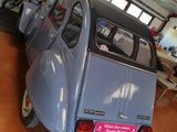 a small car that is parked in a garage