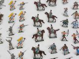 a lot of figurines that are on a table