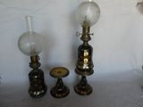 three lamps that are sitting next to each other on a table