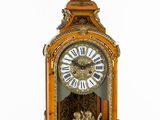 a clock that is sitting on top of a table