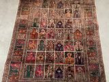 an old rug with a lot of different designs on it