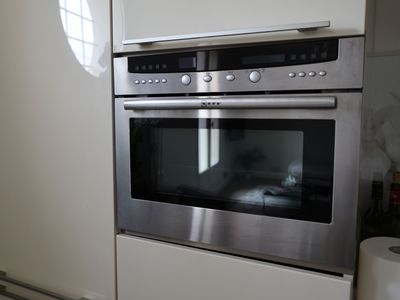 an image of a stainless steel oven in a kitchen