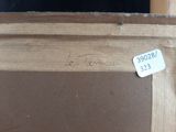 an image of a close up of a piece of wood with a label on it