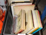two bins filled with books and other items