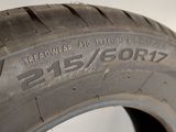 the tire of a car is shown on the floor of the room