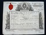 an old document with a red wax seal on it