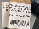a label on the handle of a bike that says, look 795 blade rs camo