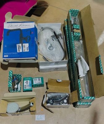 a box of assorted items sitting on the floor