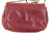 an image of a brown purse with a chain on a white background