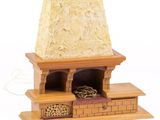 a small fireplace with logs in it on a white background