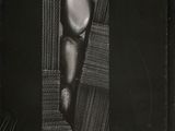 an old black and white photo of a fork sticking out of a piece of paper