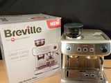 a box of brevillel coffee machines on a table